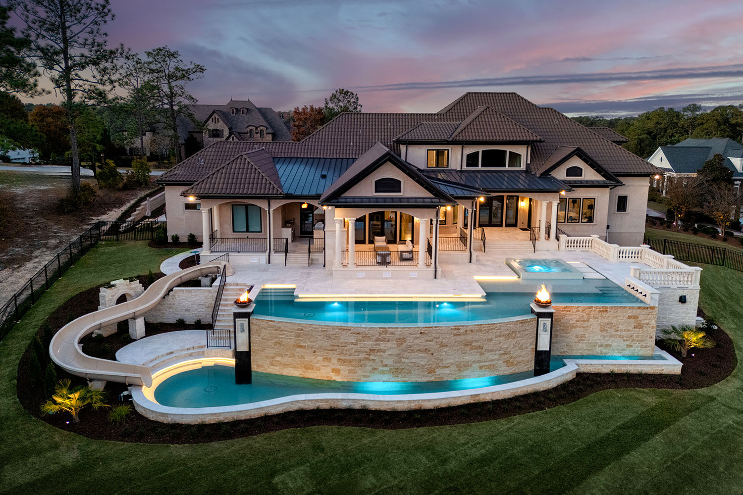 Elgin Pool Design Build with Waterslide and Fire Features